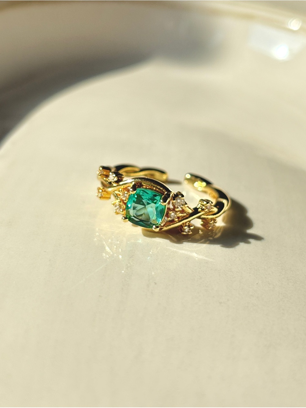 Ring with Green Cushion Gem and Accent Stones
